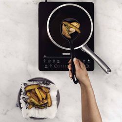 Espumadeira em Nylon Preto Ability (25158/100) - Tramontina