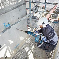 Martelo perfurador Bosch GBH 12-52 DV com SDS max em maleta