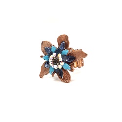 Anel de flor com pedra azul