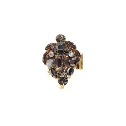 Maxi anel com pedras pretas e cristal banhado no dourado