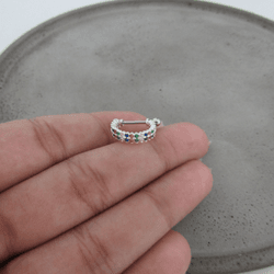 PIERCING CONCH 2 FILEIRAS UNIDAS COM ZIRCÔNIA COLO... - C Martiniano Joias