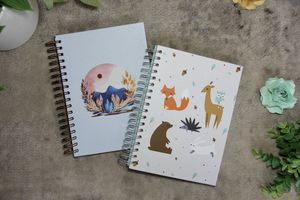 Cadernos pautados - Ícone Design