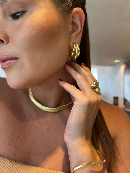 BRINCO ARGOLA TRIPLA GR M BANHADO A OURO 