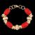 Pulseira com Acessórios e Pedra Coral Vermelho