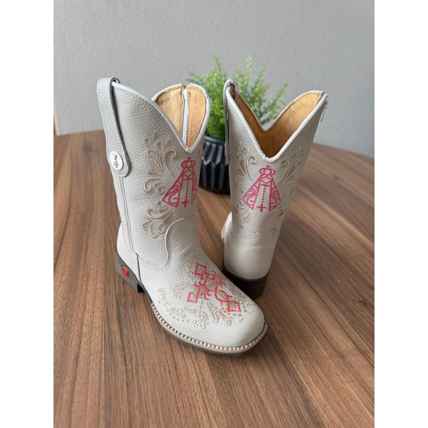 TEXANA INFANTIL EM COURO OFF WHITE BORDADO NOSSA SENHORA E CRUZ ROSA E BEGE