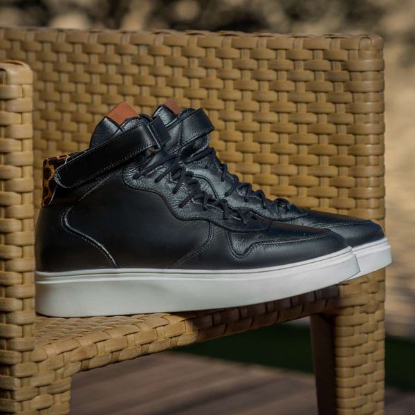 Tenis cano alto onça on sale