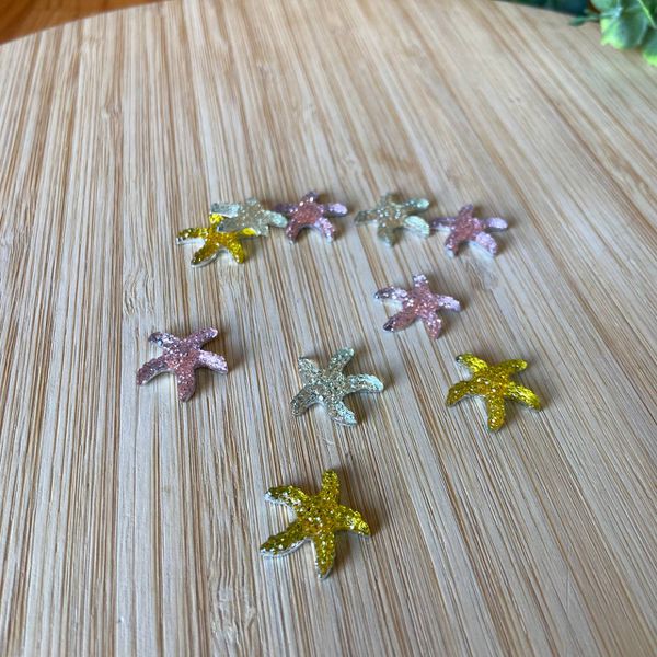 Aplique estrela com glitter 2cm sortido 10un