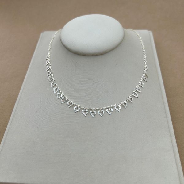 CHOKER COM CORAÇÕES VAZADOS E TRABALHADOS CARTIER
