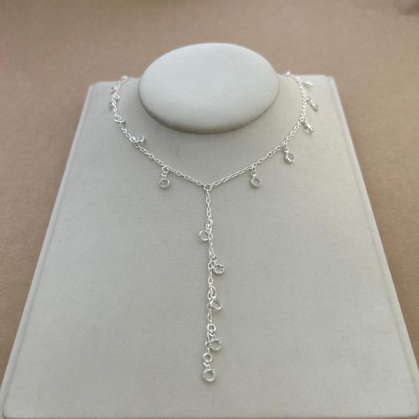 GRAVATINHA ELOS OVAIS COM VÁRIAS ZIRCÔNIAS REDONDAS 4MM PENDURADAS