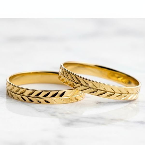 Par de Alianças Folhas Eternas 18K