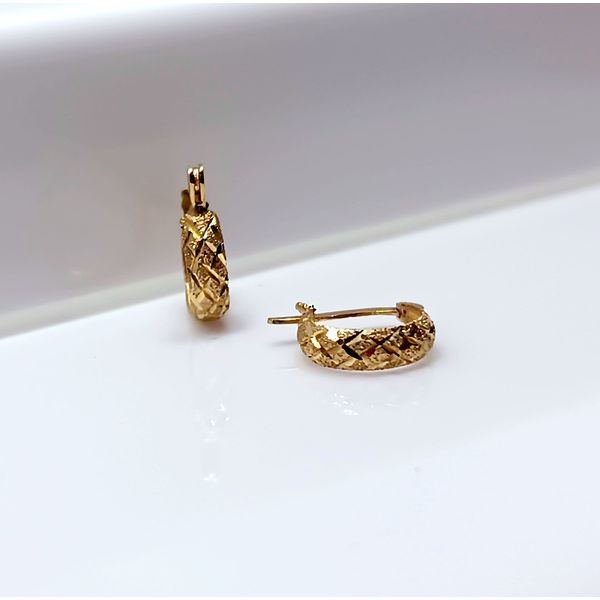 Brinco Trabalhado em Ouro 18k 