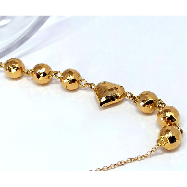 Pulseira em Ouro 18k com Bolas e Coração Diamantado