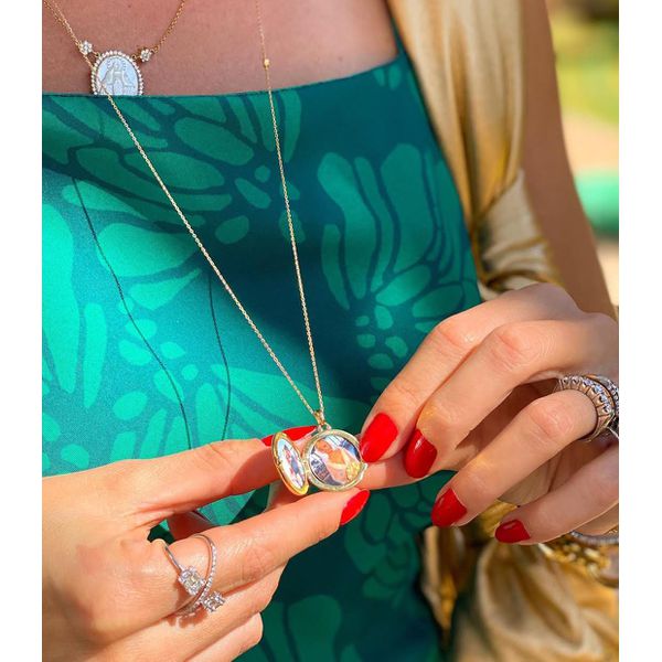 O Relicário Diamante Personalizado em Ouro 18k cravejado com Diamantes 
