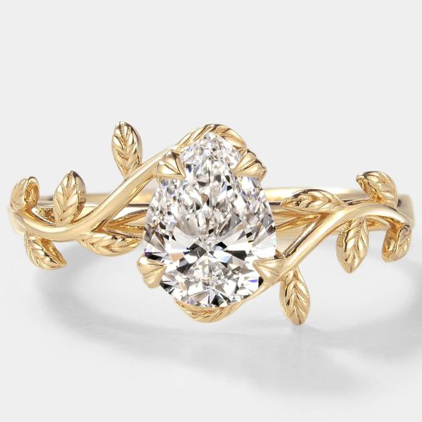 Anel de Noivado Dourados Sintético em Formato de Pera e Detalhes em Folhas