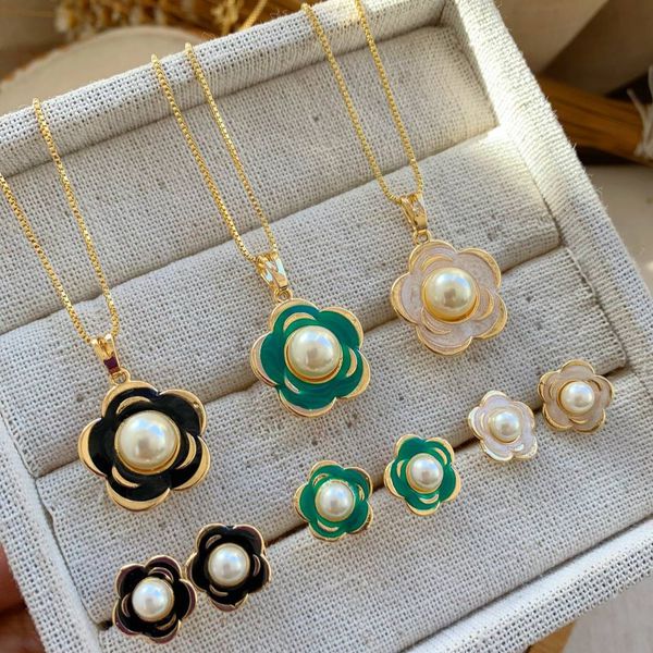 Conjunto de flor com perola 