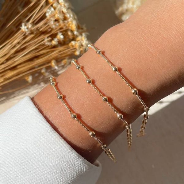 Pulseira com bolinhas delicada (cada)