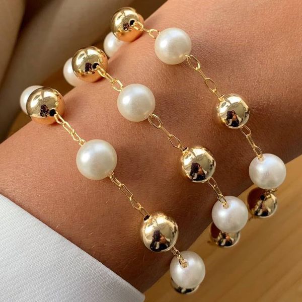 Pulseira de perola e esferas (cada)