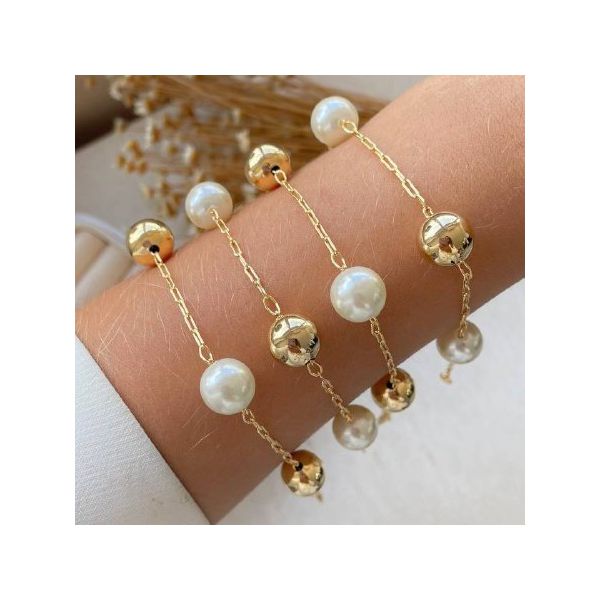 Pulseira de perolas e esfera 