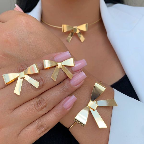 Conjunto laço aro, brinco e bracelete 