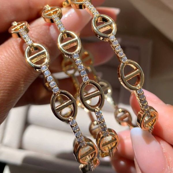 Bracelete correntaria cravejado (cada)