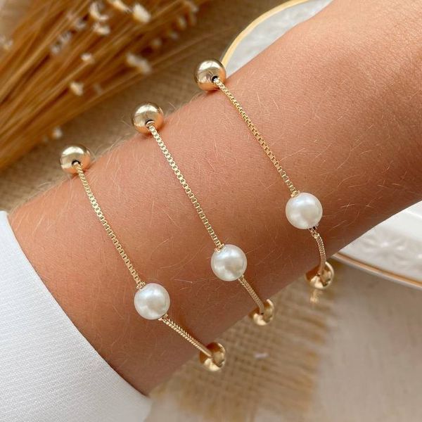 Pulseira de perola com esfera (cada)