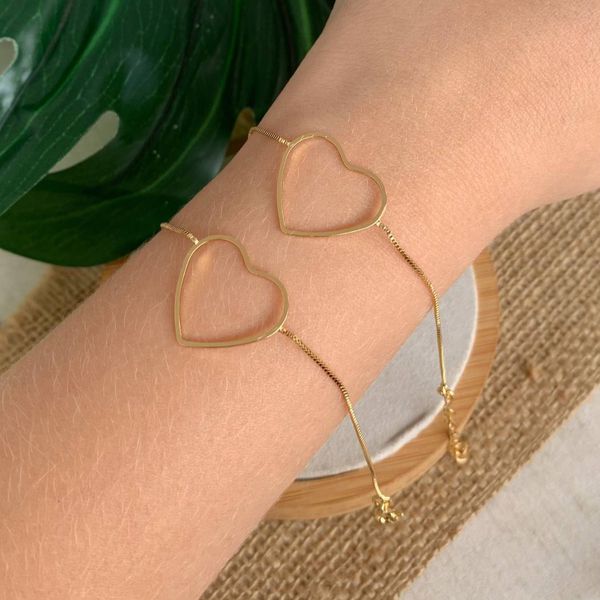 Pulseira de coração vazado (cada)