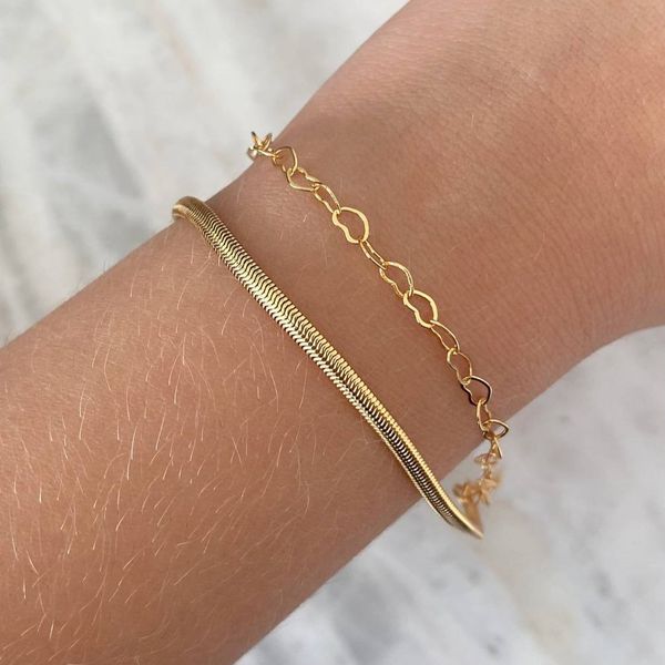 Pulseira dupla de malha com coração vazado 