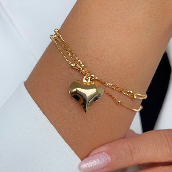 Pulseira tripla com esferas delicadas e coração 