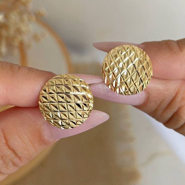 Brinco redondo com textura quadriculada