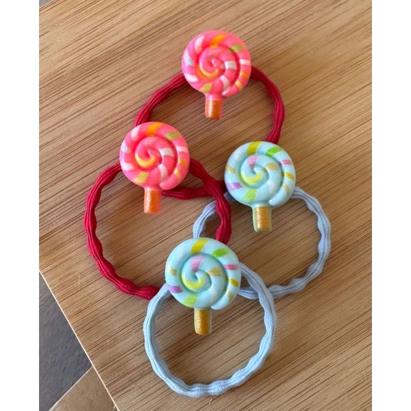 KIT COM 4 ELÁSTICOS PARA CABELO - TEMA PIRULITO - TONS DE ROSA E AZUL 