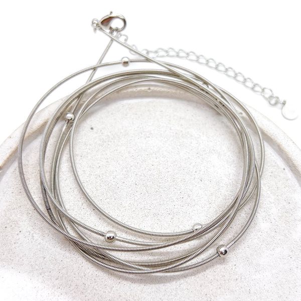 Pulseira Voltas Corda de Violão com Bolinhas Banhado a Ródio Branco