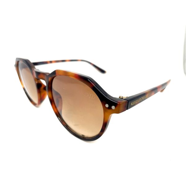 Óculos de Sol Anani HD em acetato cor animal print com as lentes policarbonato degradê marrom