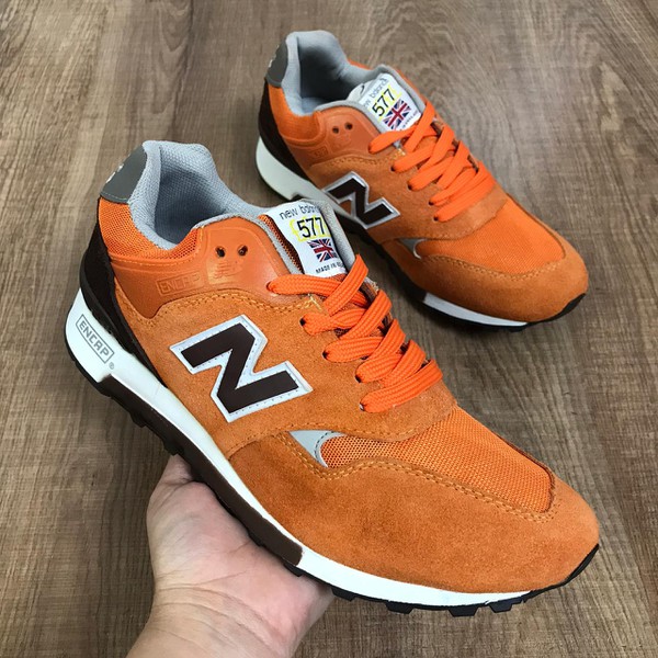 new balance laranja e azul