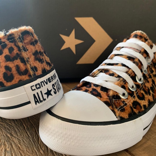 tenis all star oncinha