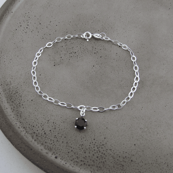 PULSEIRA ELOS OVAIS COM 1 ZIRCONIA ONIX 6MM