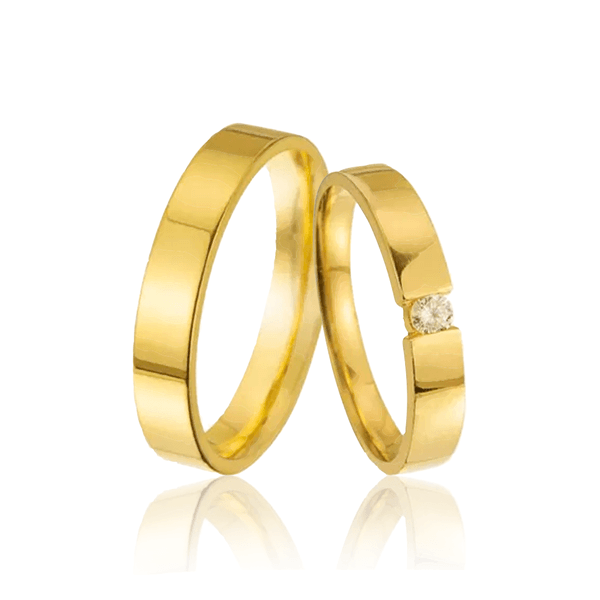 Par de Alianças com Diamante Central Ouro 18K