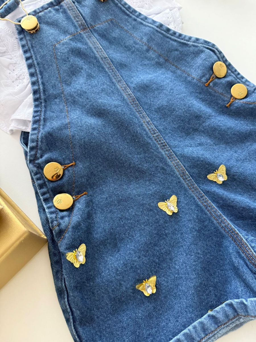 Jardineira Borboleta Jeans