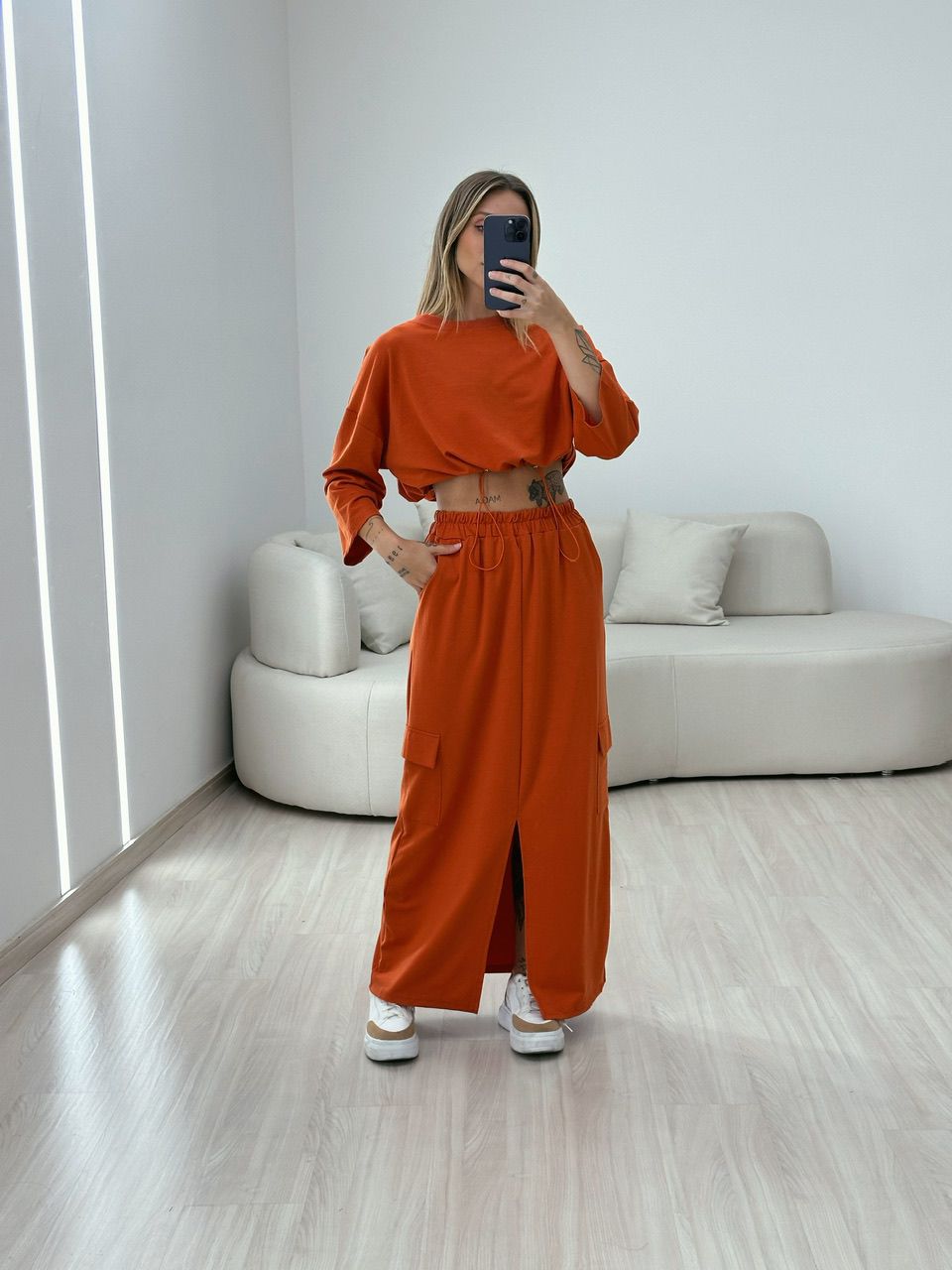 CONJUNTO MOLETINHO SAIA LARANJA