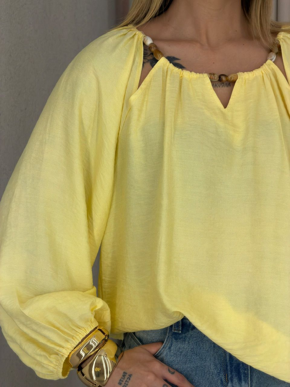 BATA NEUSA GOLA AMARELA